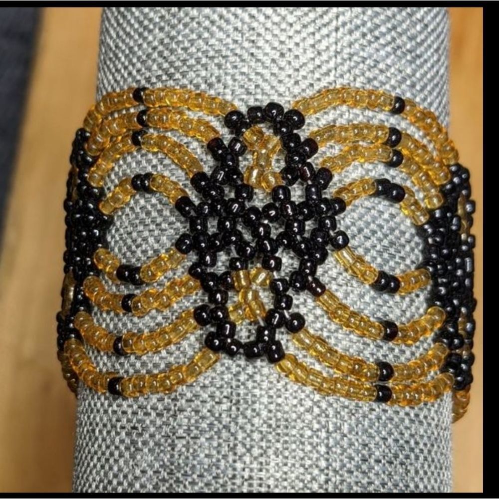Vintage light tangerine black tiny bead circle loops design snap bracelet